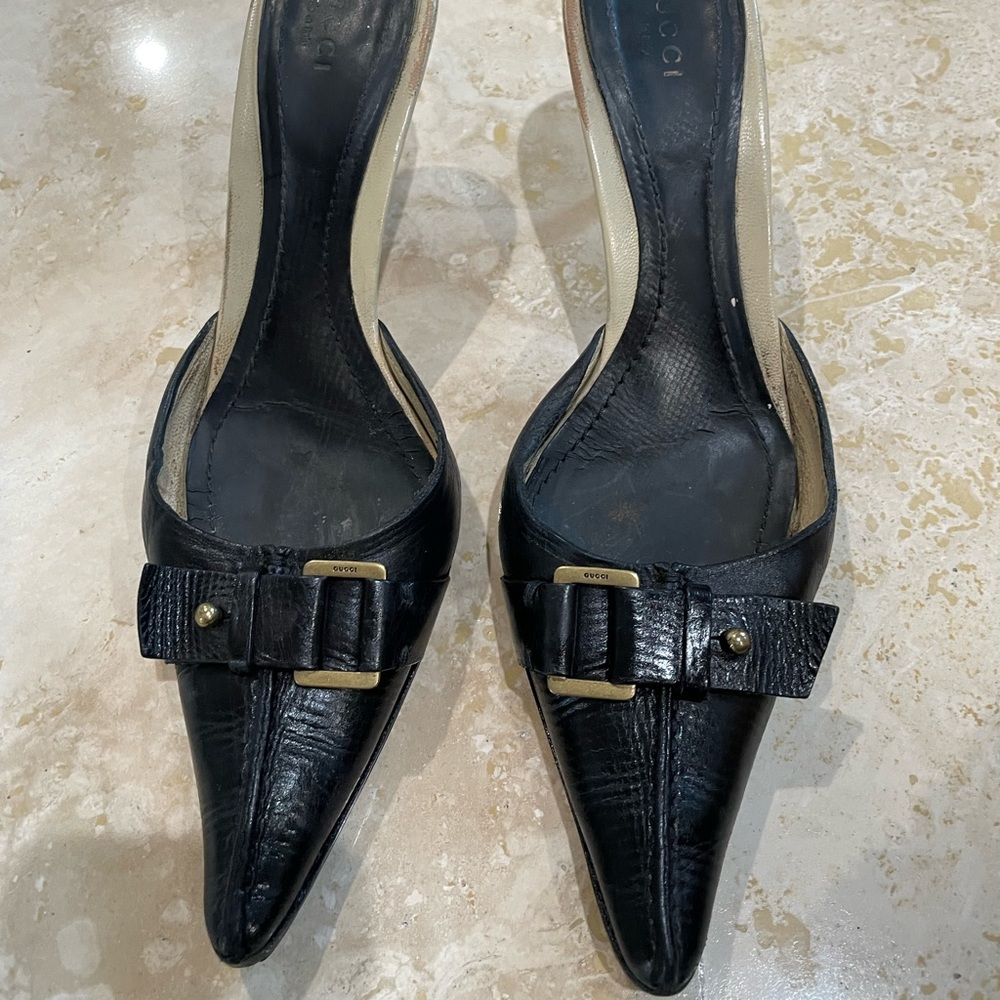 Gucci mules with buckle detail